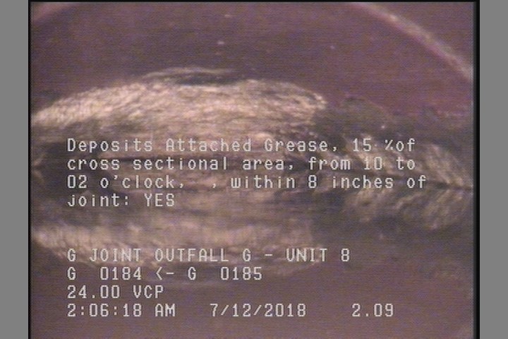Deposits Attached Grease, 15 %of cross sectional area, from 10 to 02 o'clock, , within 8 inches of joint: YES