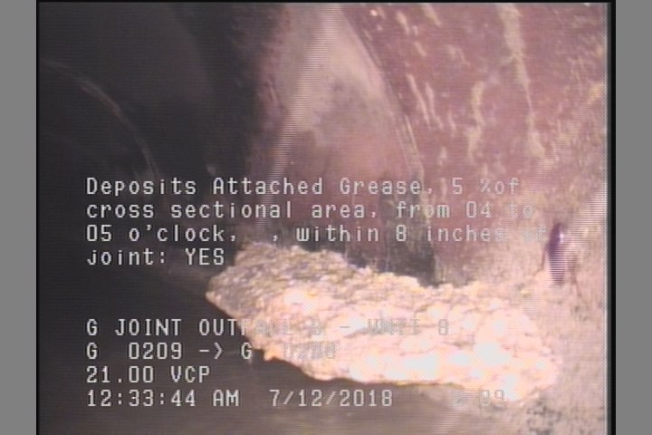 Deposits Attached Grease, 5 %of cross sectional area, from 04 to 05 o'clock, , within 8 inches of joint: YES