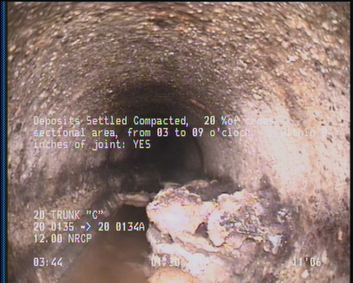 Deposits Settled Compacted, 20 %of cross sectional area, from 03 to 09 o'clock, , within 8 inches of joint: YES