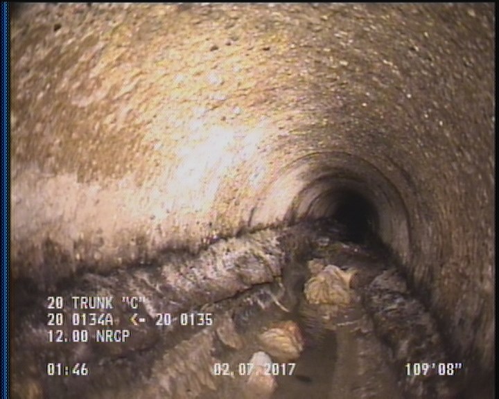 Deposits Attached Grease, 25 %of cross sectional area, from 04 to 08 o'clock, , within 8 inches of joint: YES
