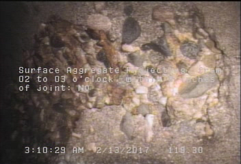 Surface Aggregate Projecting, from 02 to 03 o'clock, within 8 inches of joint: NO