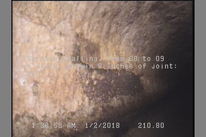 Surface Spalling, from 08 to 09 o'clock, within 8 inches of joint: YES