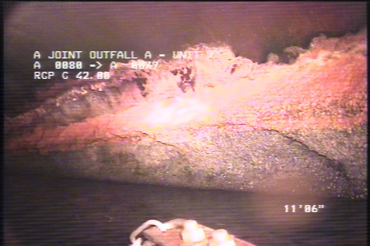 Deposits Attached Grease, 15 %of cross sectional area, from 04 to 08 o'clock, , within 8 inches of joint: NO