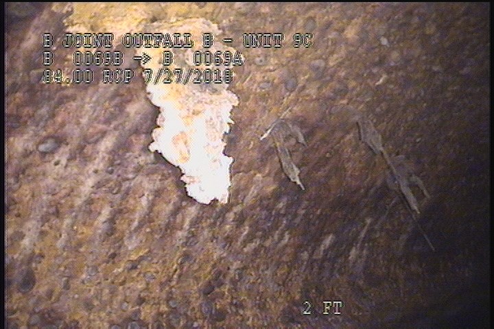 Surface Reinforcement Corroded, from 09 to 03 o'clock, within 8 inches of joint: YES - REBAR "PEELING" OFF
