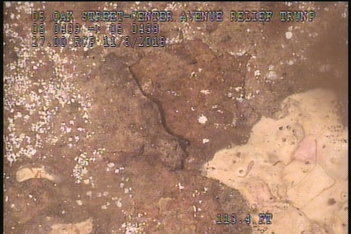 Surface Spalling, from 11 to 01 o'clock, within 8 inches of joint: NO - FLAKING CONCRETE