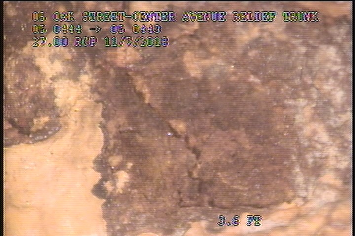 Surface Spalling, from 12 to 01 o'clock, within 8 inches of joint: NO - FLAKING CONCRETE UNDER MAG COAT