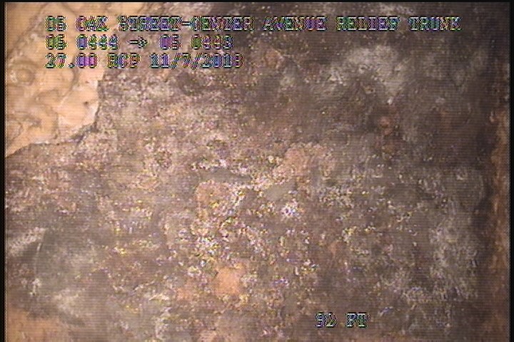 Surface Spalling, from 10 to 02 o'clock, within 8 inches of joint: NO - FLAKING CONCRETE