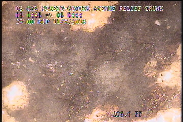 Surface Spalling, from 01 to 02 o'clock, within 8 inches of joint: NO - FLAKING CONCRETE UNDER MAG COAT