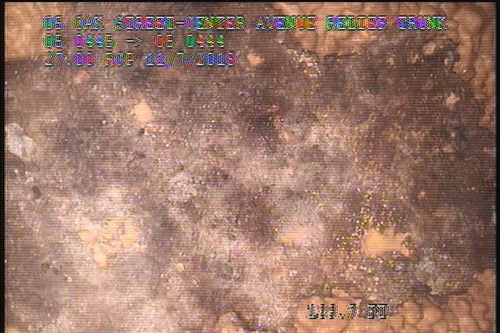 Surface Spalling, from 11 to 01 o'clock, within 8 inches of joint: NO - SWOLLEN FLAKING CONCRETE