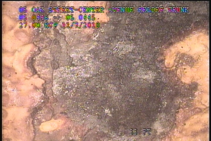 Surface Spalling, from 09 to 10 o'clock, within 8 inches of joint: NO - FLAKING CONCRETE UNDER MAG COAT