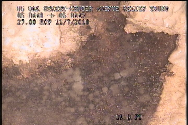 Surface Spalling, from 12 to 01 o'clock, within 8 inches of joint: NO - FAKING CONCRETE UNDER MAG COAT