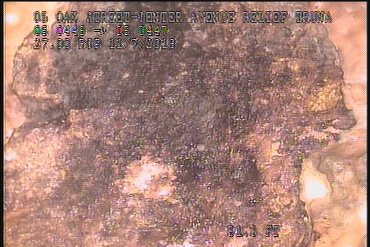 Surface Spalling, from 11 to 01 o'clock, within 8 inches of joint: NO - FLAKING CONCRETE UNDER MAG COAT