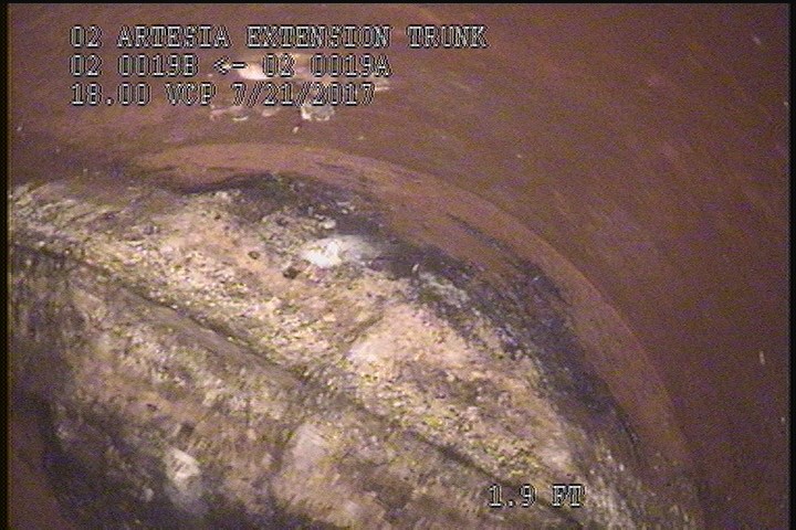 Deposits Attached Grease, 50 %of cross sectional area, from 01 to 11 o'clock, , within 8 inches of joint: NO