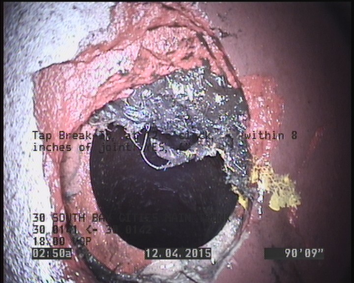 Tap Break-In, at 12 o'clock, -, within 8 inches of joint: YES, 6"