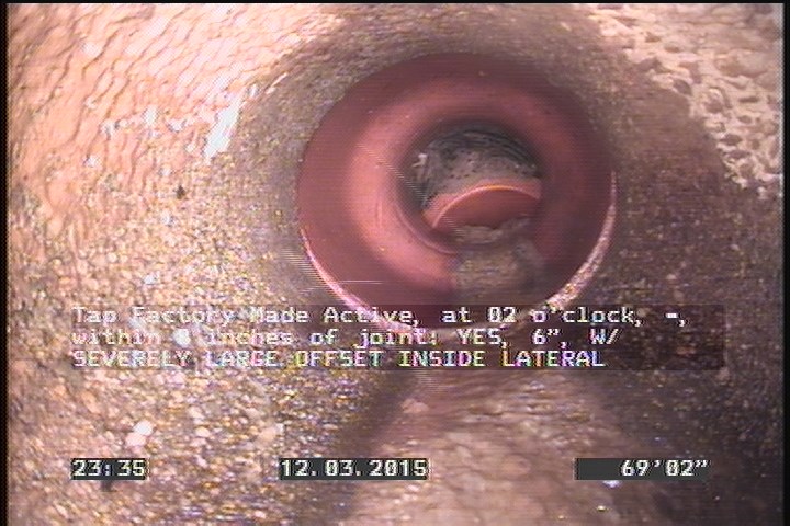 Tap Factory Made Active, at 02 o'clock, -, within 8 inches of joint: YES, 6" - W/ SEVERELY LARGE OFFSET INSIDE LATERAL