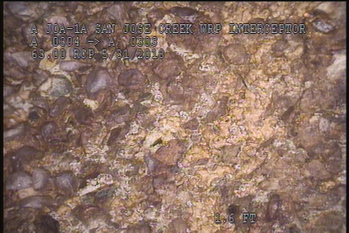 Surface Aggregate Projecting, from 09 to 03 o'clock, within 8 inches of joint: YES