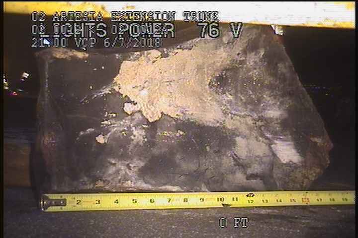 General Observation - PIPE PIECE FOUND MH# 11(2" THICK)