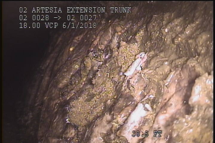 Deposits Settled Other, 50 %of cross sectional area, from 03 to 09 o'clock, , within 8 inches of joint: NO - SLUDGE