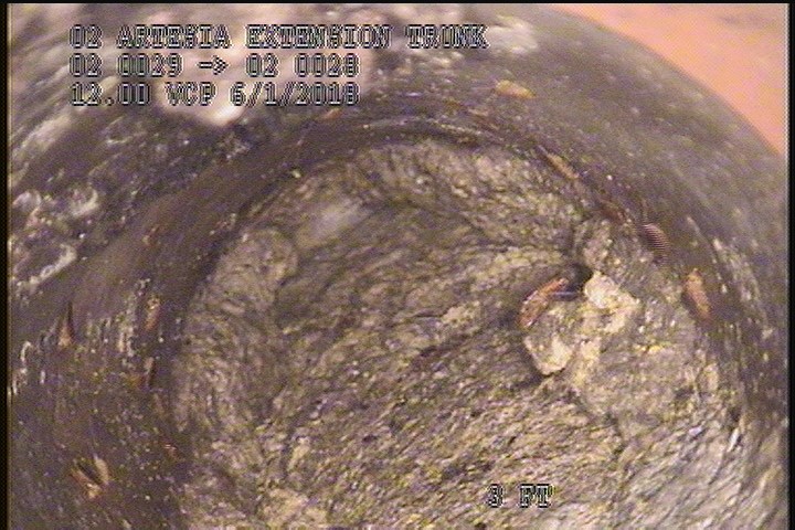 Deposits Settled Other, 100 %of cross sectional area, from 12 to 11 o'clock, , within 8 inches of joint: NO - GREASE SLUDGE
