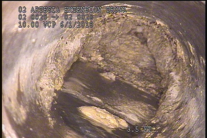 Deposits Attached Grease, 70 %of cross sectional area, from 08 to 04 o'clock, , within 8 inches of joint: NO