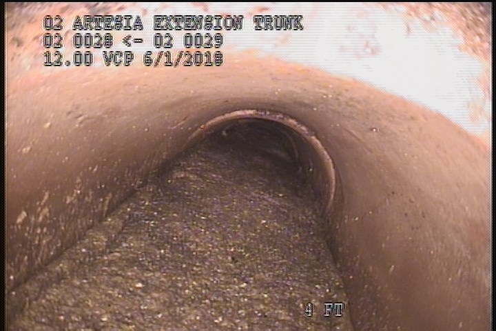 Deposits Attached Grease, 40 %of cross sectional area, from 03 to 09 o'clock, , within 8 inches of joint: YES