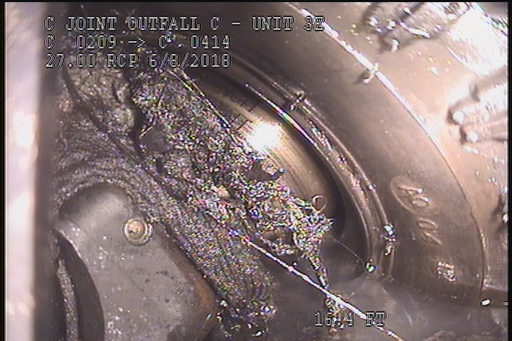 Deposits Settled Other, 5 %of cross sectional area, from 05 to 07 o'clock, , within 8 inches of joint: YES, Start - SLUDGE INDUSTRIAL WASTE
