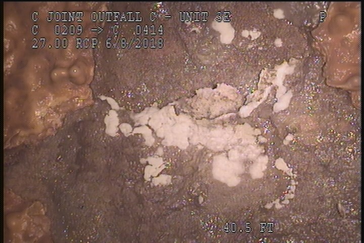 Surface Spalling, from 11 to 01 o'clock, within 8 inches of joint: NO - PEELING CONCRETE