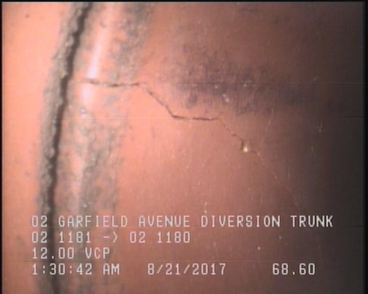 Crack Multiple, from 07 to 05 o'clock, within 8 inches of joint: YES