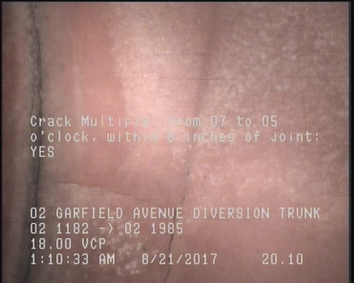 Crack Multiple, from 07 to 05 o'clock, within 8 inches of joint: YES