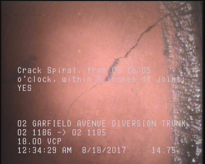 Crack Spiral, from 03 to 05 o'clock, within 8 inches of joint: YES