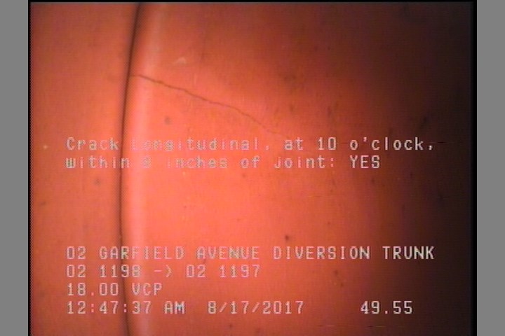 Crack Longitudinal, at 10 o'clock, within 8 inches of joint: YES
