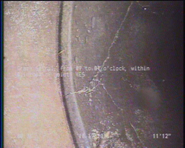 Crack Spiral, from 09 to 01 o'clock, within 8 inches of joint: YES