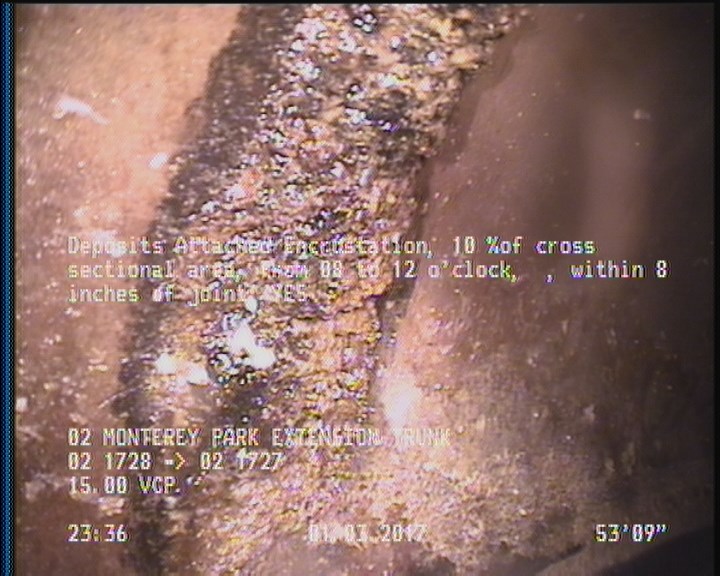 Deposits Attached Encrustation, 10 %of cross sectional area, from 08 to 12 o'clock, , within 8 inches of joint: YES