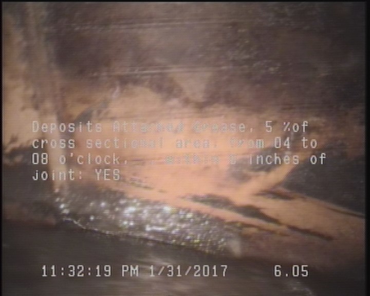 Deposits Attached Grease, 5 %of cross sectional area, from 04 to 08 o'clock, , within 8 inches of joint: YES
