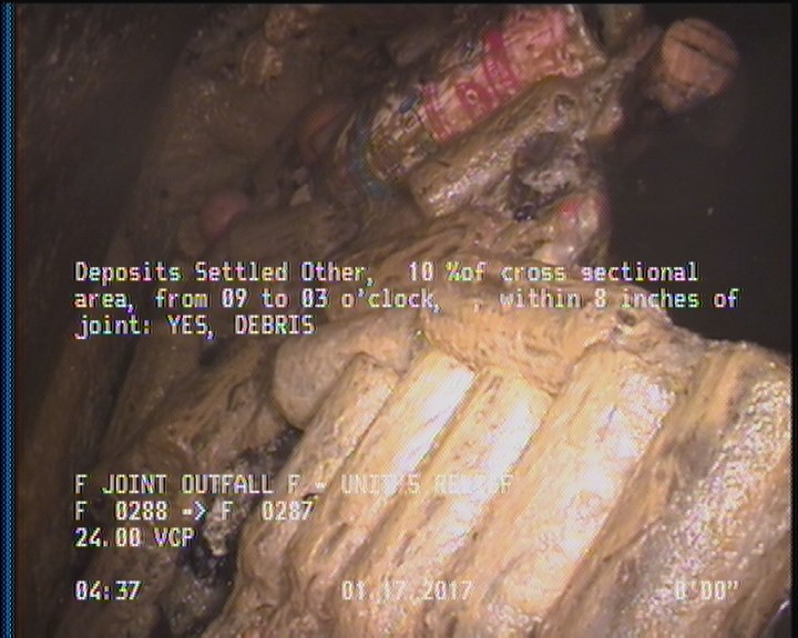 Deposits Settled Other, 10 %of cross sectional area, from 09 to 03 o'clock, , within 8 inches of joint: YES - DEBRIS