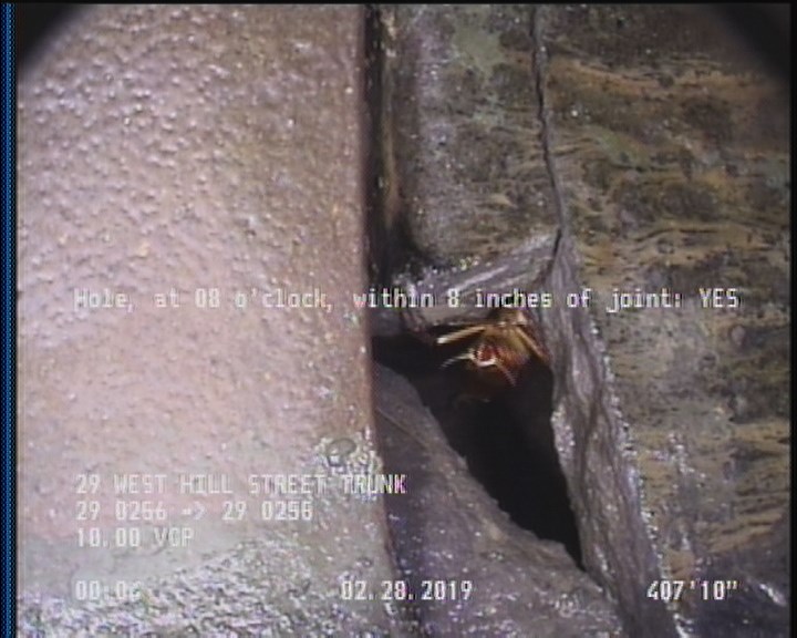 Hole, at 08 o'clock, within 8 inches of joint: YES