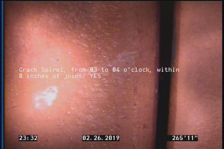 Crack Spiral, from 03 to 04 o'clock, within 8 inches of joint: YES