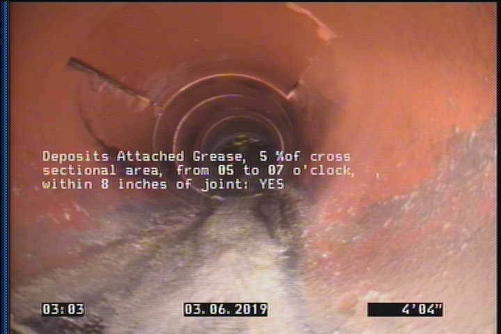 Deposits Attached Grease, 5 %of cross sectional area, from 05 to 07 o'clock, , within 8 inches of joint: YES