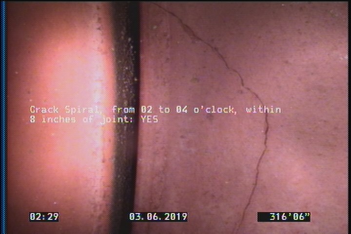 Crack Spiral, from 02 to 04 o'clock, within 8 inches of joint: YES