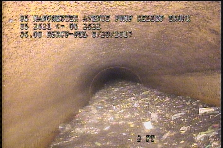 Deposits Settled Other, 50 %of cross sectional area, from 03 to 09 o'clock, , within 8 inches of joint: YES - DEBRIS