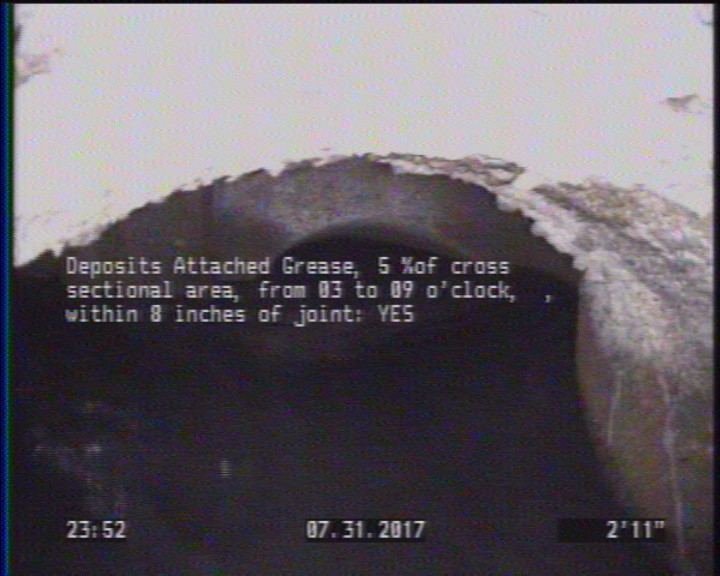 Deposits Attached Grease, 5 %of cross sectional area, from 03 to 09 o'clock, , within 8 inches of joint: YES