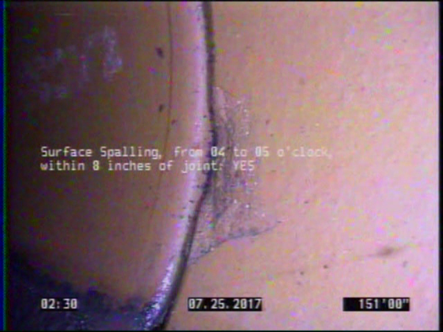 Surface Spalling, from 04 to 05 o'clock, within 8 inches of joint: YES