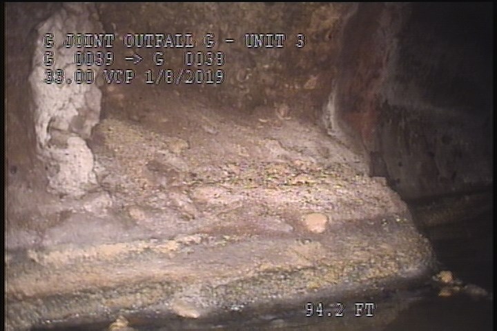 Deposits Attached Encrustation, 15 %of cross sectional area, from 07 to 09 o'clock, , within 8 inches of joint: YES - GREASE
