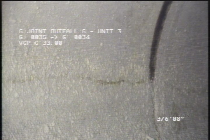 Fracture Longitudinal, at 12 o'clock, within 8 inches of joint: YES - POSSIBLE HAIRLINE UNDER WHITE COATING