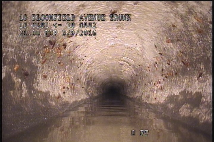 Downstream Manhole, Survey Begins - 8:42 AM