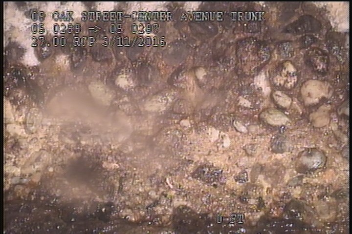 Surface Aggregate Projecting, at 04 o'clock, within 8 inches of joint: YES, Start - SEVERE