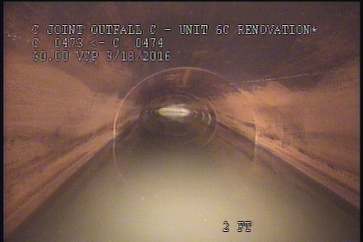 Downstream Manhole, Survey Begins - 8:50 AM