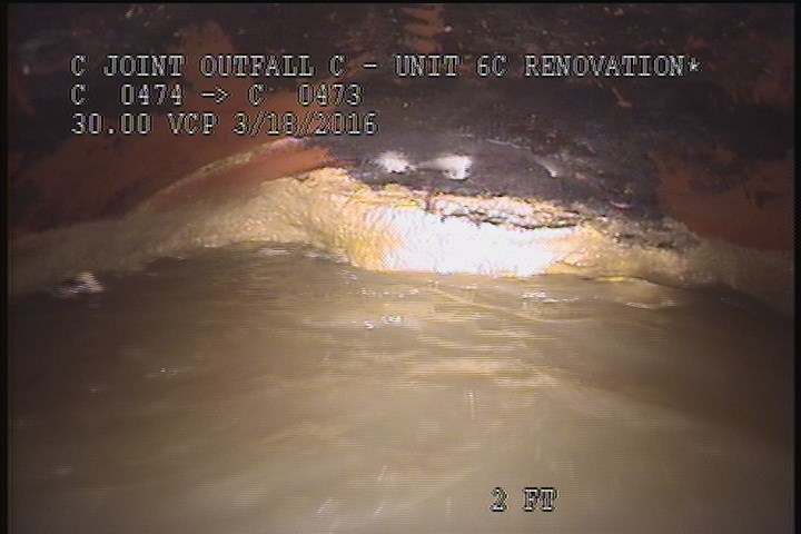 Deposits Attached Grease, 15 %of cross sectional area, from 10 to 02 o'clock, , within 8 inches of joint: YES