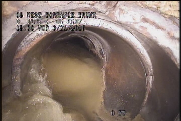 Downstream Manhole, Survey Begins - 9:09 AM