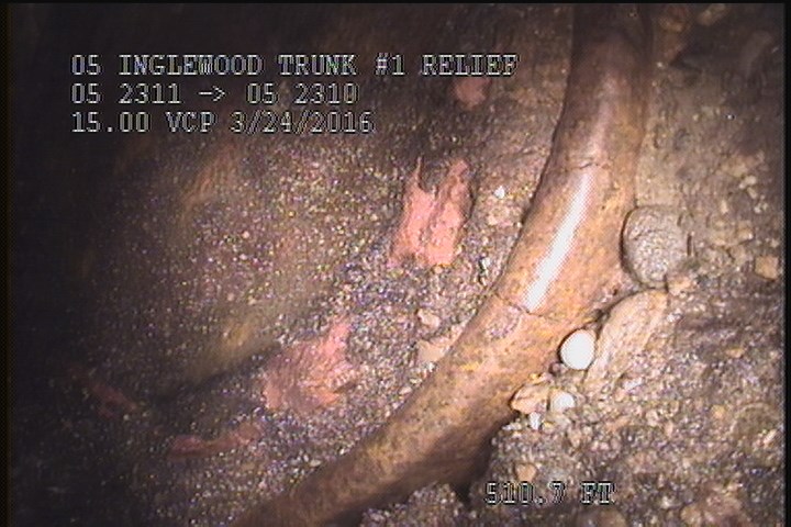 General Observation - CONCRETE BULKHEADED CONN. INSIDE THE MH. @ 03 O'CLOCK